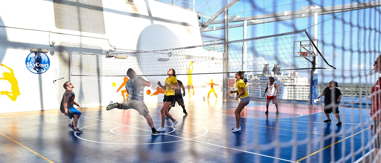 Spill volleyball med havutsikt